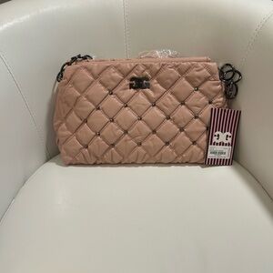 Gilda Paris waffle quilted handbag.
